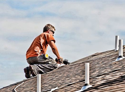 A man repairing a roof.