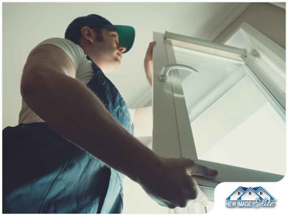 A man fixing a window