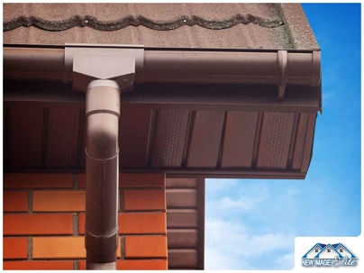 Brown gutters and orange bricks.